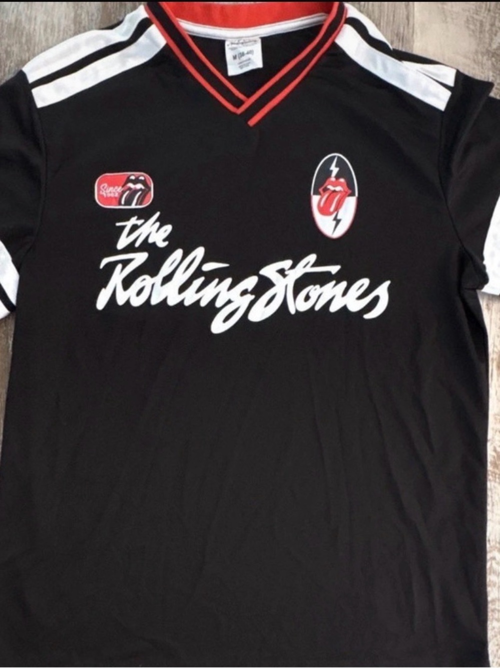 The Rolling Stones Black V‑Neck Logo Jersey with Red & White Accents